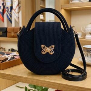 Bolso redondo artesanal de cuerda de algodón - Mariposa